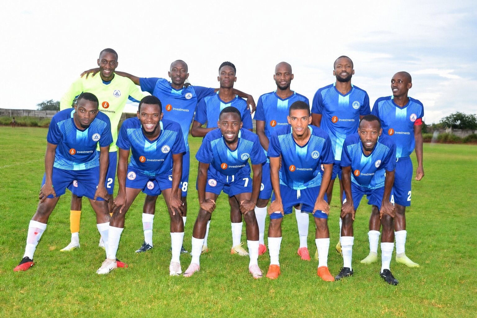 Sponsored team in blue PS Investments kit